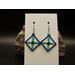 Machine embroidered diamond shaped earrings. Yellow background with dk blue & turquoise. Rainbow hooks, aqua crystal rivet in the center.
