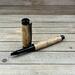 Black locust burl and black hardware rollerball pen