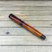 Brownish red cocobolo rosewood rollerball pen