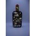 View of bottle with fairy lights on with darker lighting
