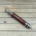 Grenade pen made with screw bean mesquite wood