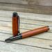 exotic rollerball pen with gunmetal plating 