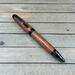 Exotic wood and gunmetal hardware cigar 