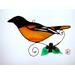 Baltimore Oriole on a light box- light on.