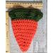 Crocheted carrot treat pouch shown with rulers to show size while empty. 5inches on top and tapers to a point. 6inches long.