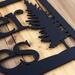 Close up of matte black powder coat on our rectangular custom metal sign.