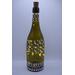 Full view of bottle with fairy lights on and low lighting
