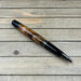 Gunmetal twist pen with plum wood