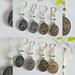 Gold and Silver Taurus Zodiac Coin Earrings with Emerald Gemstones