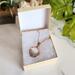 Mother of Pearl and Turquoise Copper Wire Wrapped Tree Necklace in packaging