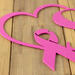 Close up of pink powder coat on our breast cancer survivor metal plaque.