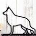 Close up of Belgian Shepherd metal wall art, in matte black powder coat.