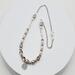 18.5-inch necklace featuring lampwork beads, Swarovski pearls, and a stainless steel pendant, set on a steel chain with silver-toned accents
