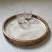 Wooden serving tray styled with crystal glasses.  Handles are cut out of the wood rim of the tray making it easy to carry.