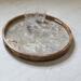 Styled ottoman  tray with design of neutral colors and glitter. Great addition to home decor or gift.