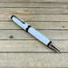 shimmering white ballpoint pen