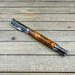 magnetic cap fountain pen with resin cast pinecones