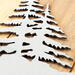 Close up of raw steel on our pine tree metal house number sign.