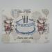 Watercolor design, hot air balloon background featuring cake with gold foil accented candles surrounded by teacups
