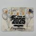 Cream watercolor background graduation card with black graduation cap with gold tassel, cream balloons highlighted in shimmery paints 