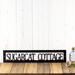 Hanging rectangular personalized cottage name metal sign, in matte black powder coat.