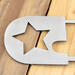 Close up of raw steel on our newborn baby boy or girl name and birth year metal sign.