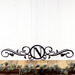 Metal monogram sign with vines, in matte black powder coat.
