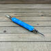Double ended seam ripper in powder blue and white