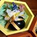Each cauldron has a bee charm and bow