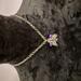 3 pointed Elven star in jewelry grade nickel free metal and purple crystal beads. 18" chain