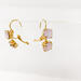 Double pale pink handset earrings in a gold color setting with the base metal of brass.