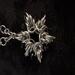 6 pointed Elven Star Chainmail Necklace with black crystal beads. Rings are nickel free metal with a 22" chain
