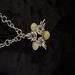 3 pointed Elven Star Chainmail Necklace with yellow glass beads with a crackle finish. Metal is nickel free with a 21" chain.