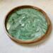 Shades of green swirl together with white and gold on this 18” wooden serving tray.  A great gift.
