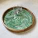 Serve up your favorite cocktails and bring appetizers out to the garden with this large green and white serving tray.