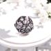 Silver button for jewelry designers with a leaf motif