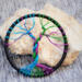 compact tree of life standing in front a quartz crystal chunky rock