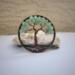 front view tree standing in front of quartz crystal rock