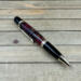 Pinecone pen with gold pen components 