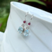 Blue topaz and garnet earrings in sterling silver by MariesGems.