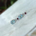 Blue topaz and garnet earrings in sterling silver by MariesGems.