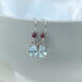 Blue topaz and garnet earrings in sterling silver by MariesGems.
