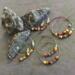 Beautiful handmade hoop earrings with colorful beads.