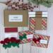 A handmade Christmas card kit with plaid scrapbook paper, cardstock, stamped sentiment, crochet bow embellishment and envelope for 6 cards.
