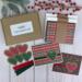 A handmade Christmas card making kit with winterberries and plaid scrapbook paper, cardstock, embellishments and envelopes to make 6 cards.