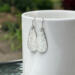 Hammered sterling silver teardrop dangle earrings by MariesGems.