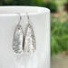 Hammered sterling silver teardrop dangle earrings by MariesGems.