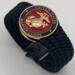Very thin, flexible and comfortable black US Marine Corps bracelet featuring a 24K gold plated USMC Eagle Globe & Anchor and a Cobra buckle.