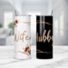 Close-up of “Hubby” on black tumbler with gold accents
“Wifey EST." tumbler in white with gold sparkle detailing
