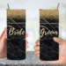 Woman holding BRIDE tumbler with veil in background
Groom holding matching tumbler in suit

